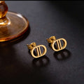 Gold Oval Dior Stud Earrings